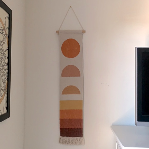 UO: Hanging weaved tapestry sign